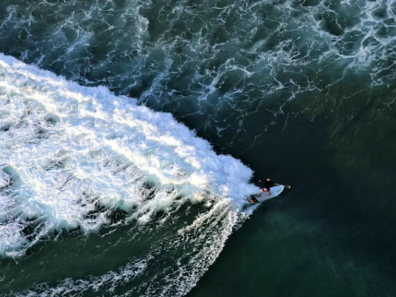 Surfer in Ponta do Ouro, Mozambique