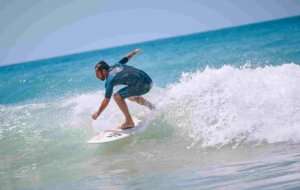 Surfer riding a wave in the south of Spain