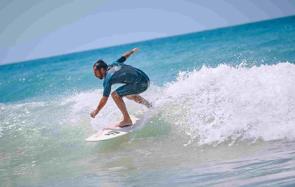 Surfer riding a wave in the south of Spain