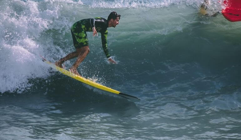 A guy catching a wave 