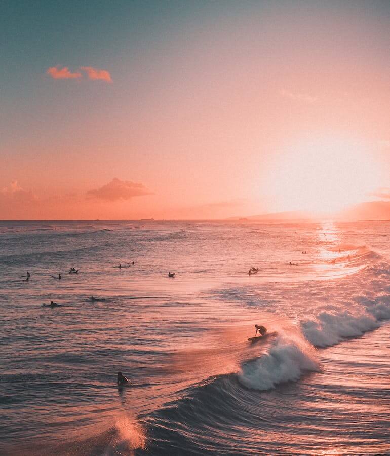 Drone view of a beach at Oahu, Hawaii during the sunset