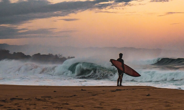 surfer looking at the waves