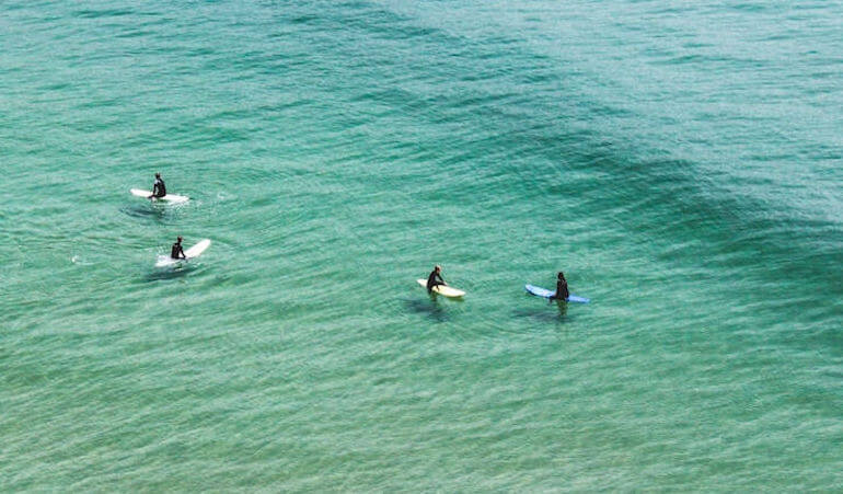 Surfers waiting for waves 