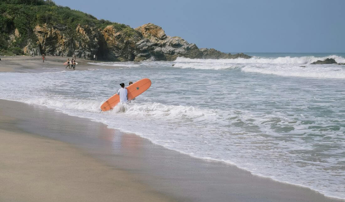 longboard surfer in puerto escondido