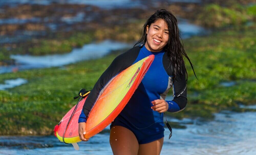 Woman wearing surf suit