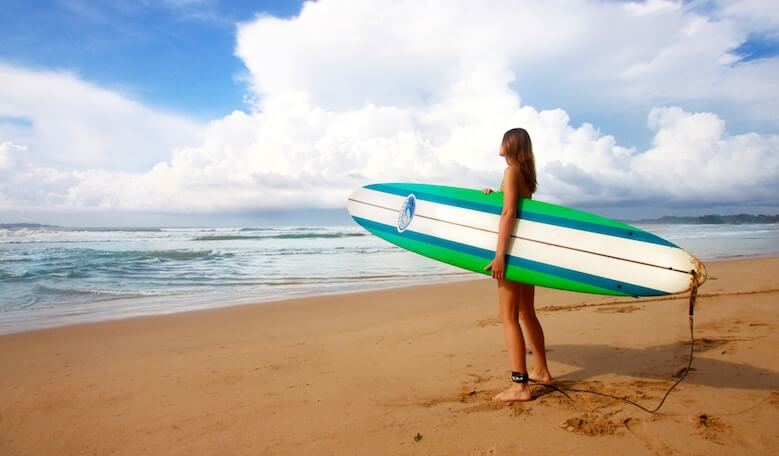 Girl with her first surfboard