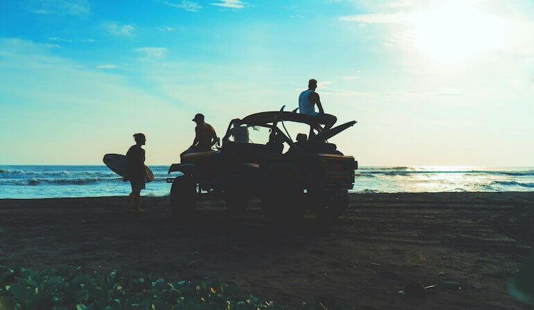 A bunch of friends on a surf trip 