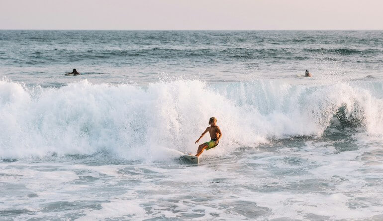 Boy surfing el Tunco 