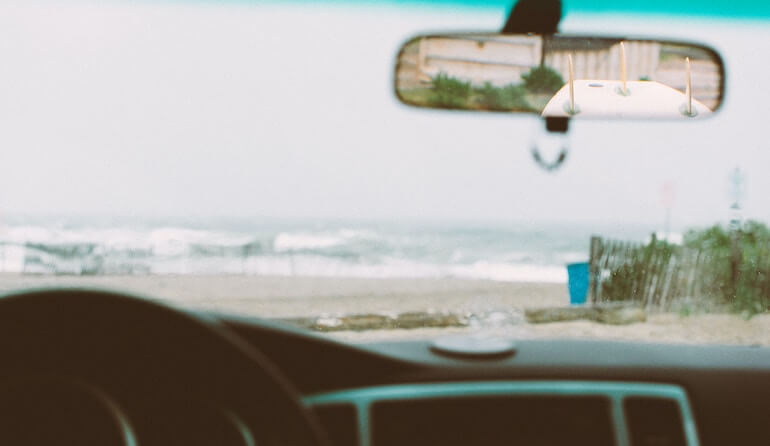 Checking the surf from the car 