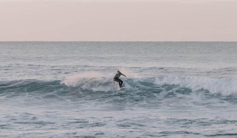 Surfer riding a wave 