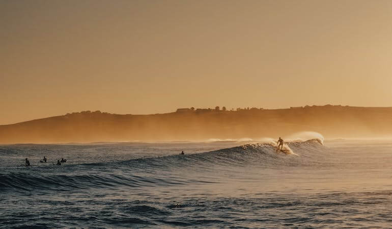 Surfer catching a wave 