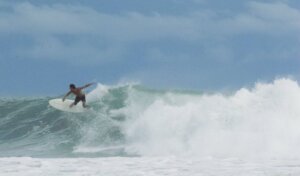 Surfer on an epic wave