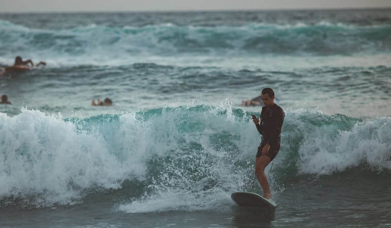 Surfer catching a wave