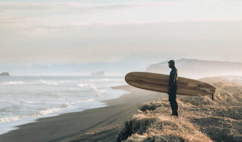 Surfer observing the waves 